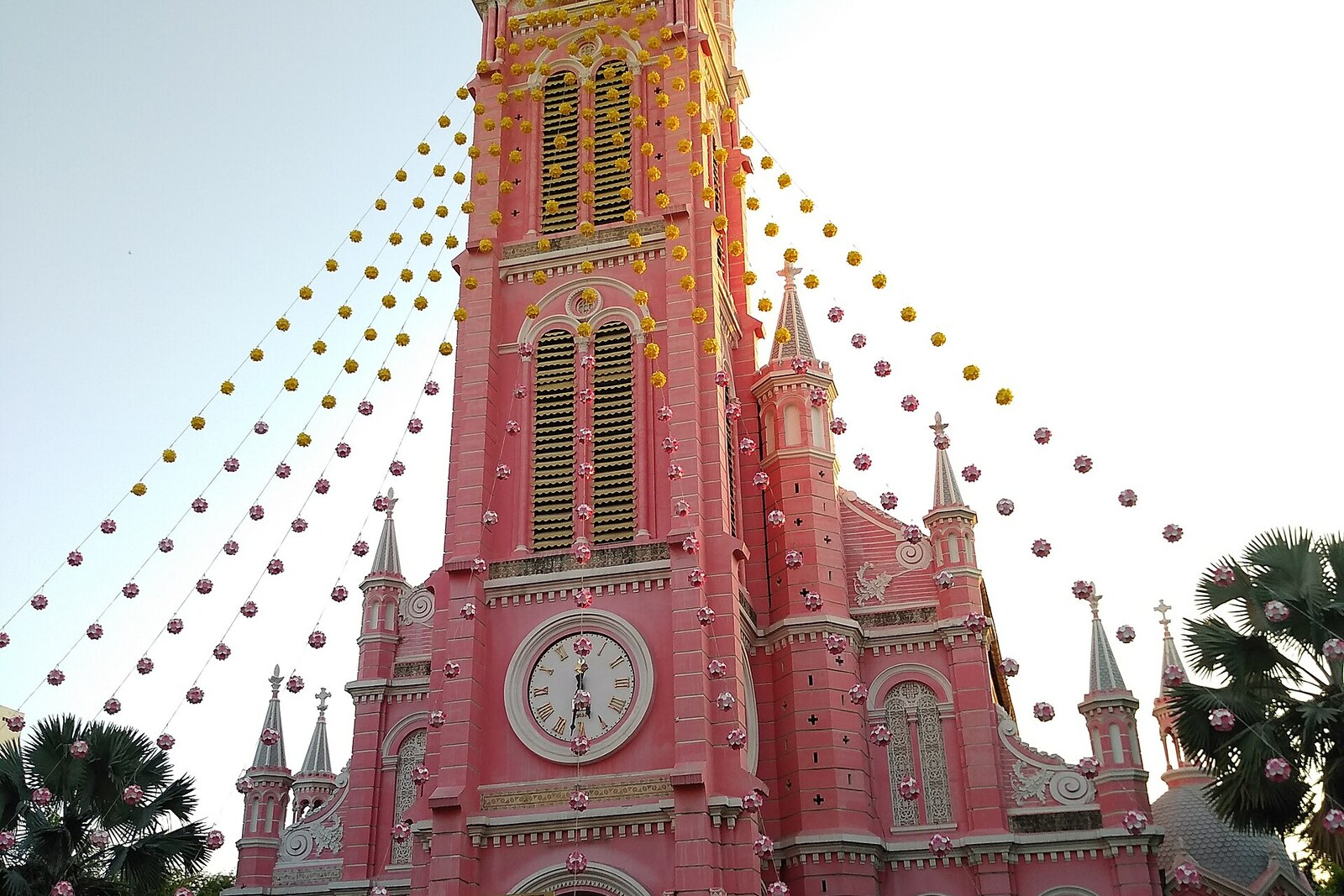 Front view of the pink facade of Tân Định Church in Ho Chi Minh City.