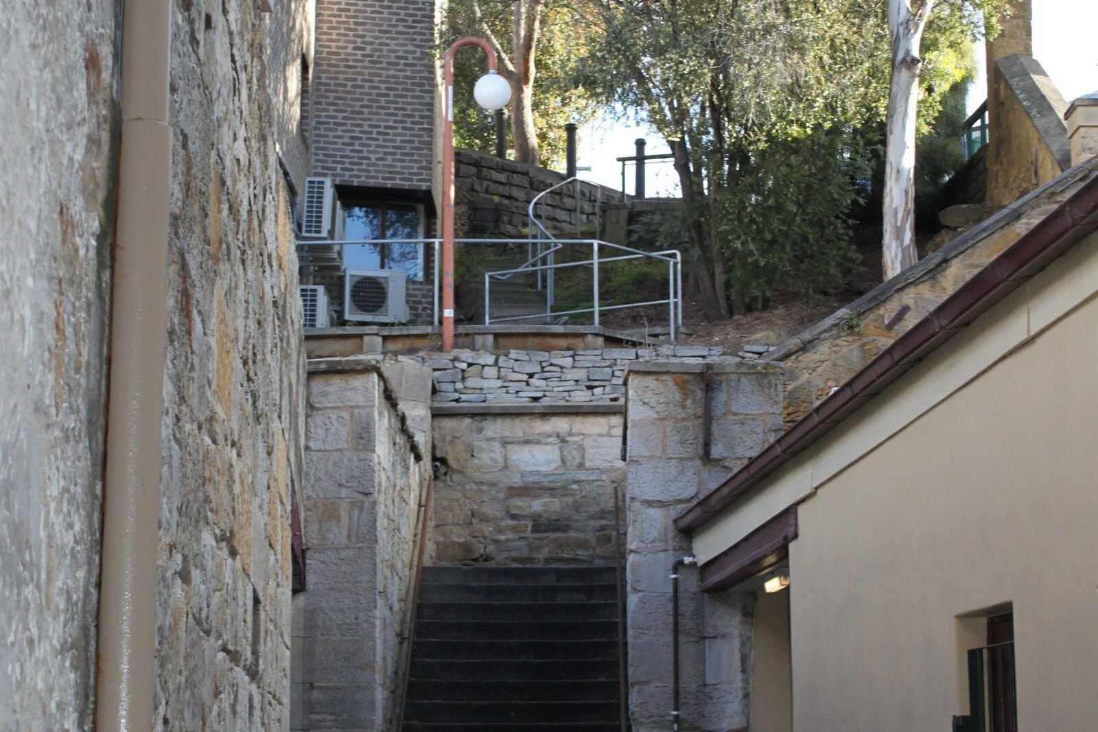 Steep stone steps in the narrow passage of Kelly's Steps.