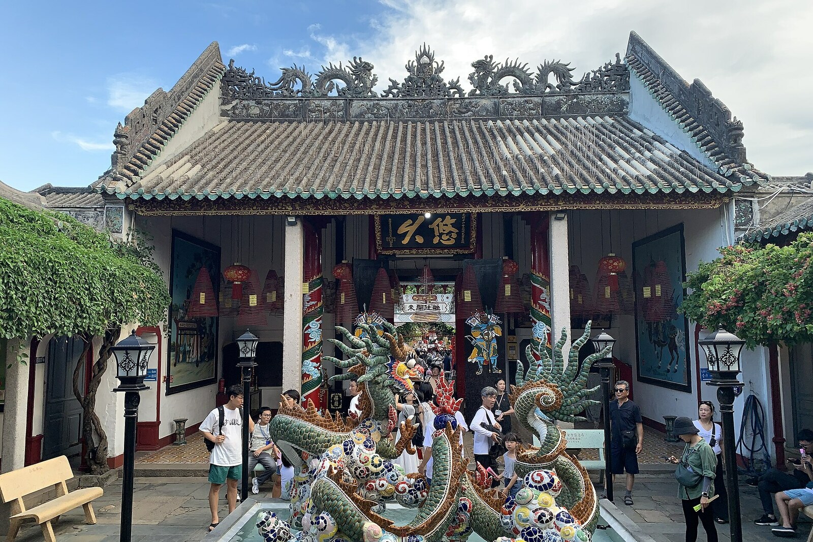 The courtyard of the Cantonese Assembly Hall in Hoi An, with dragon figures.