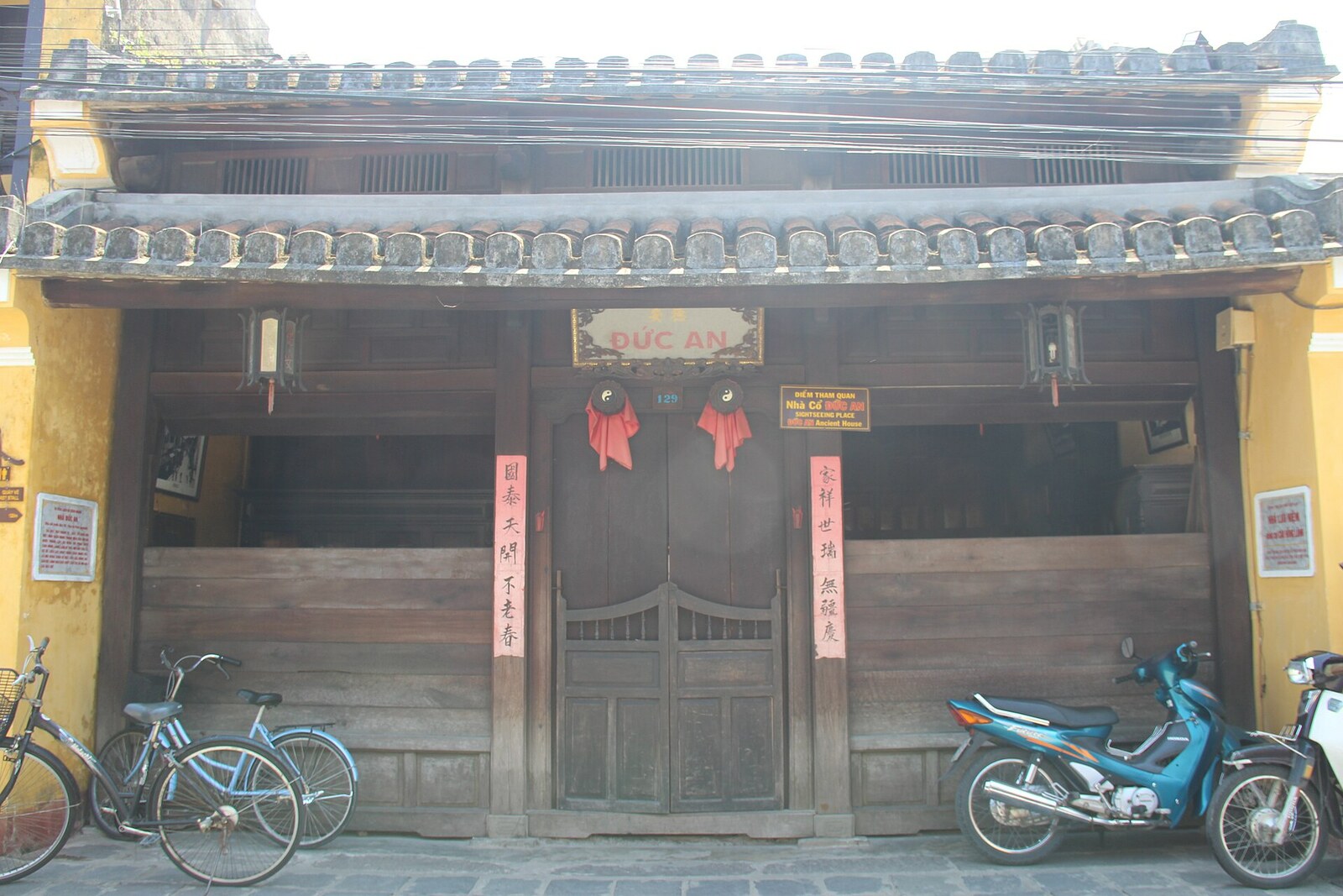 The wooden façade of Duc An House on Tran Phu Street.