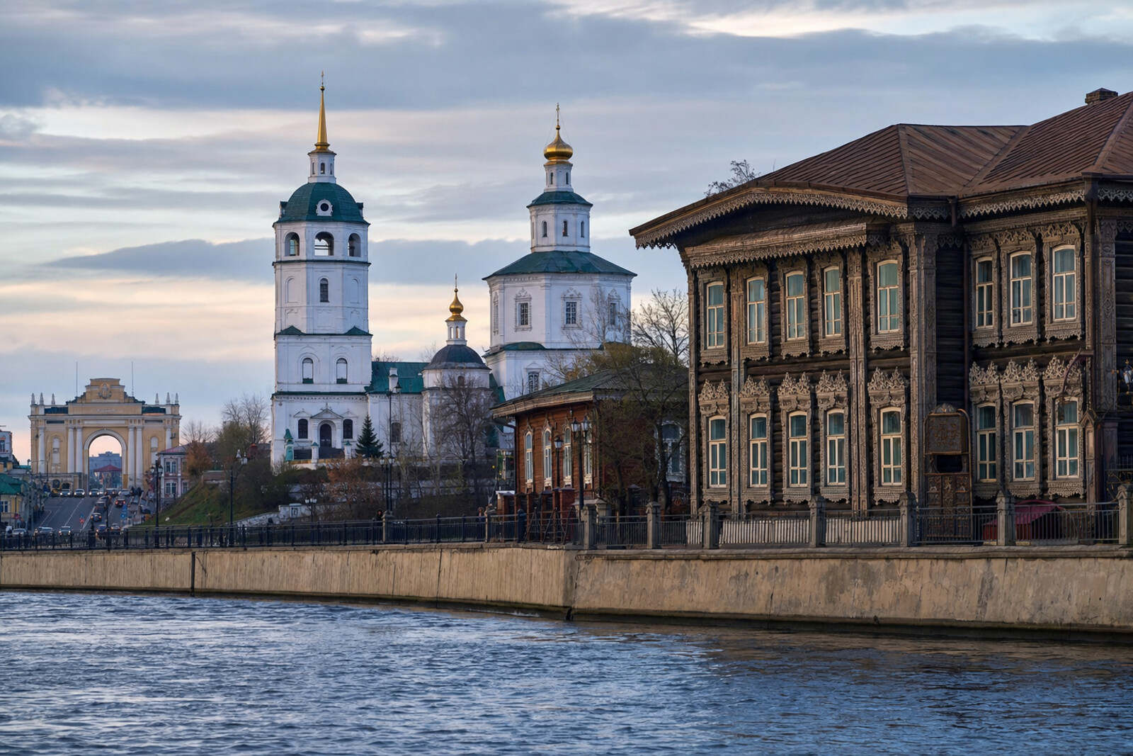 Stylized route cover: the Angara River, wooden carving, and old Irkutsk.