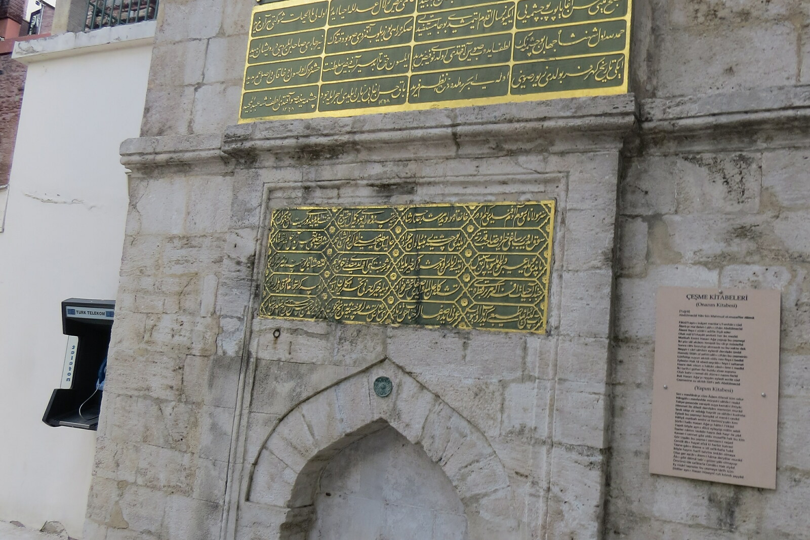 The courtyard of the Galata Mevlevi Lodge with a mausoleum and cypresses