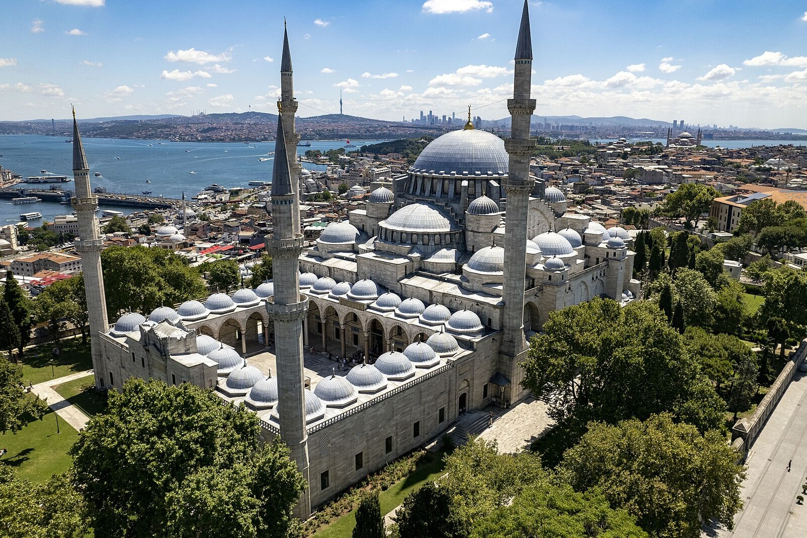 The domes and four minarets of Süleymaniye Mosque on a hill above Istanbul