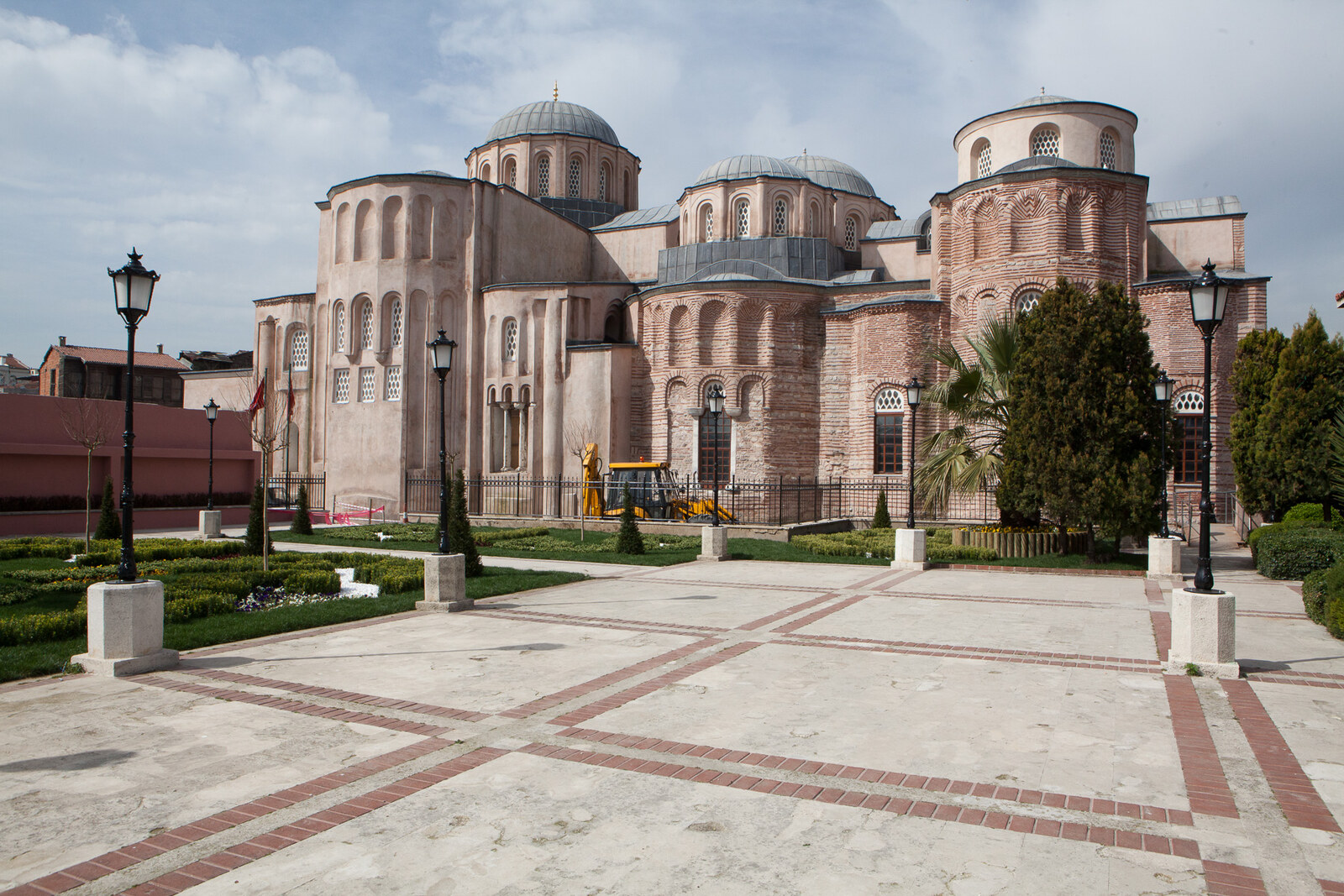 The brick complex of Molla Zeyrek with several domes against the sky