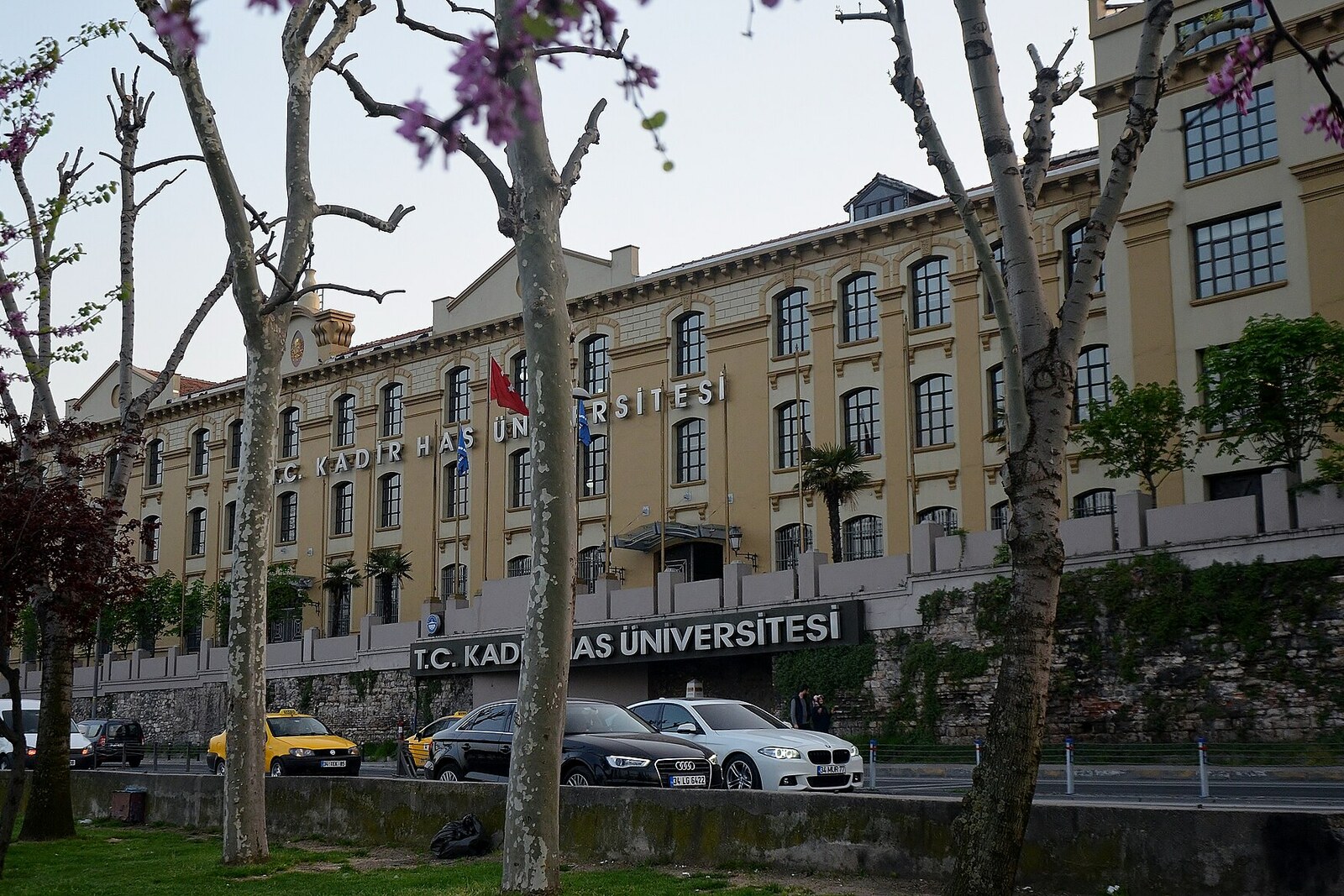 Long red-brick building of Kadir Has University on the shore of the Golden Horn