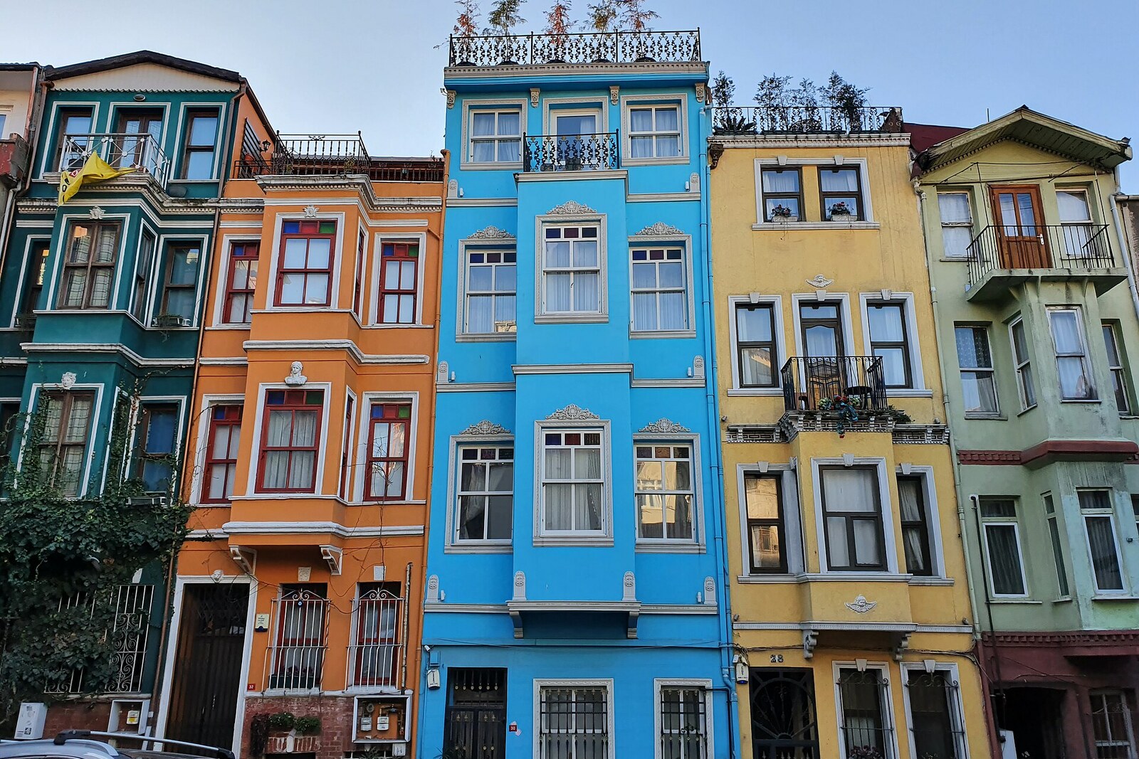 Colorful wooden houses of Balat on a steep downhill street