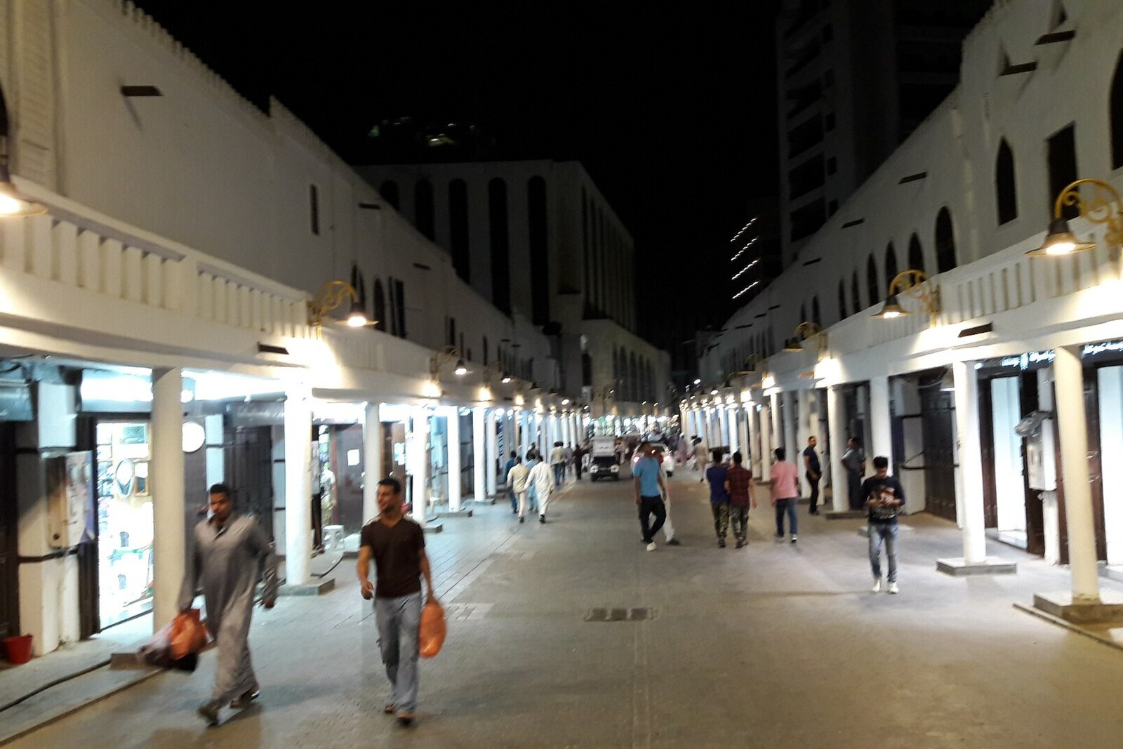 A straight commercial view along Kabil Street in Al-Balad