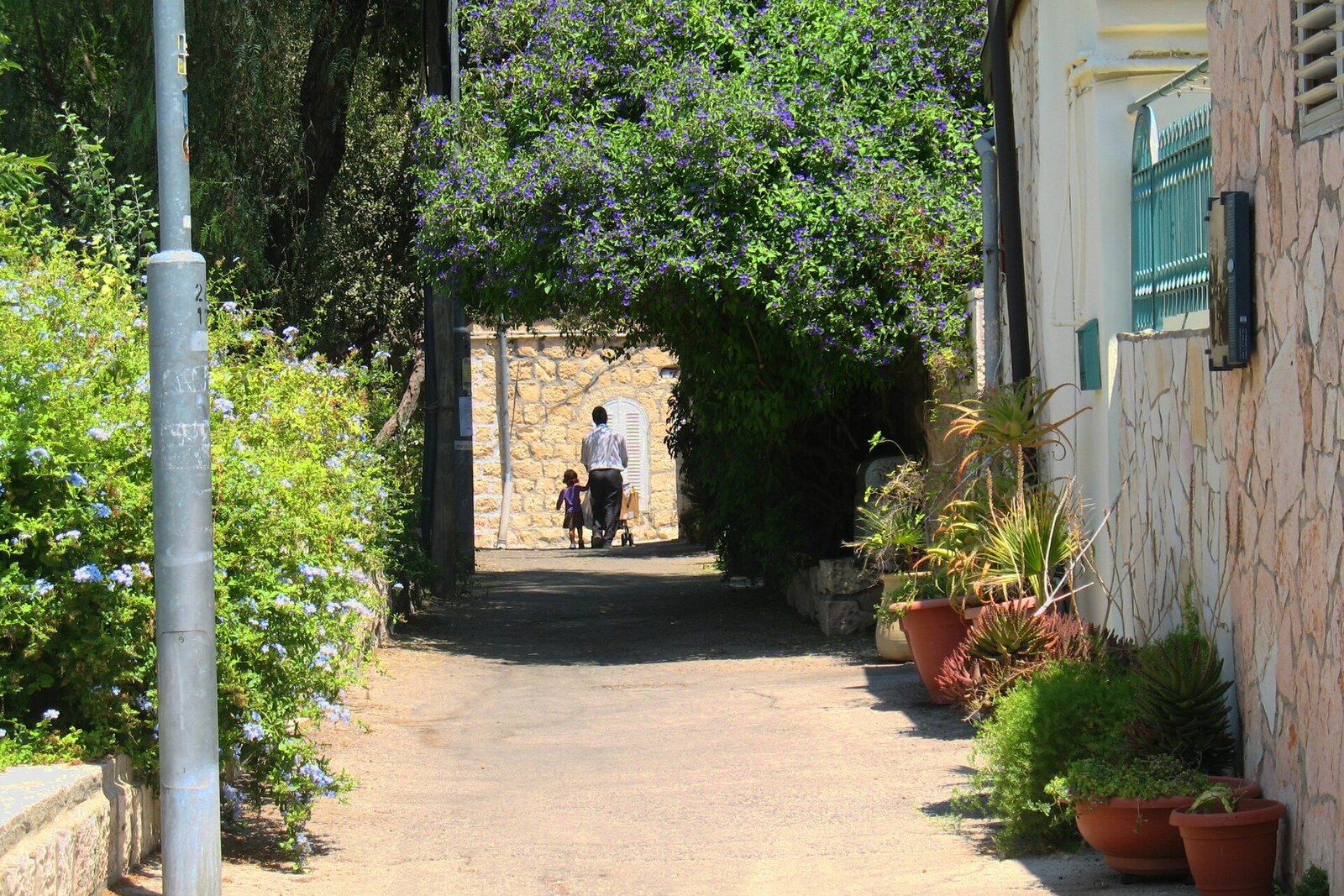 A narrow stone alley in the Nachlaot neighborhood of Jerusalem.