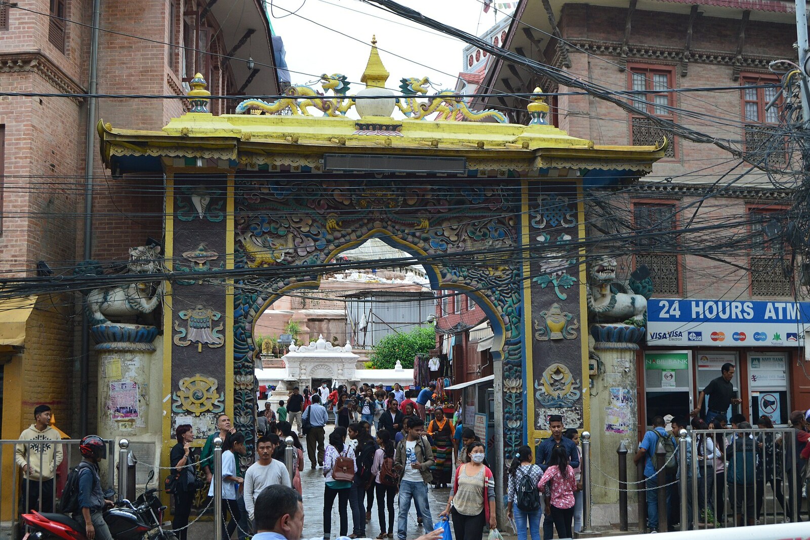 The main gate of Boudhanath Stupa with dragon images and ornamentation