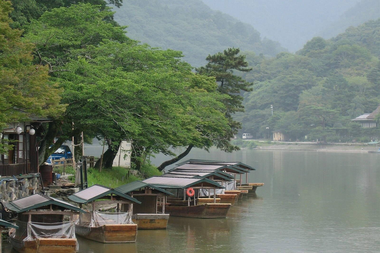 Boats on Hozu River Kyoto Japan