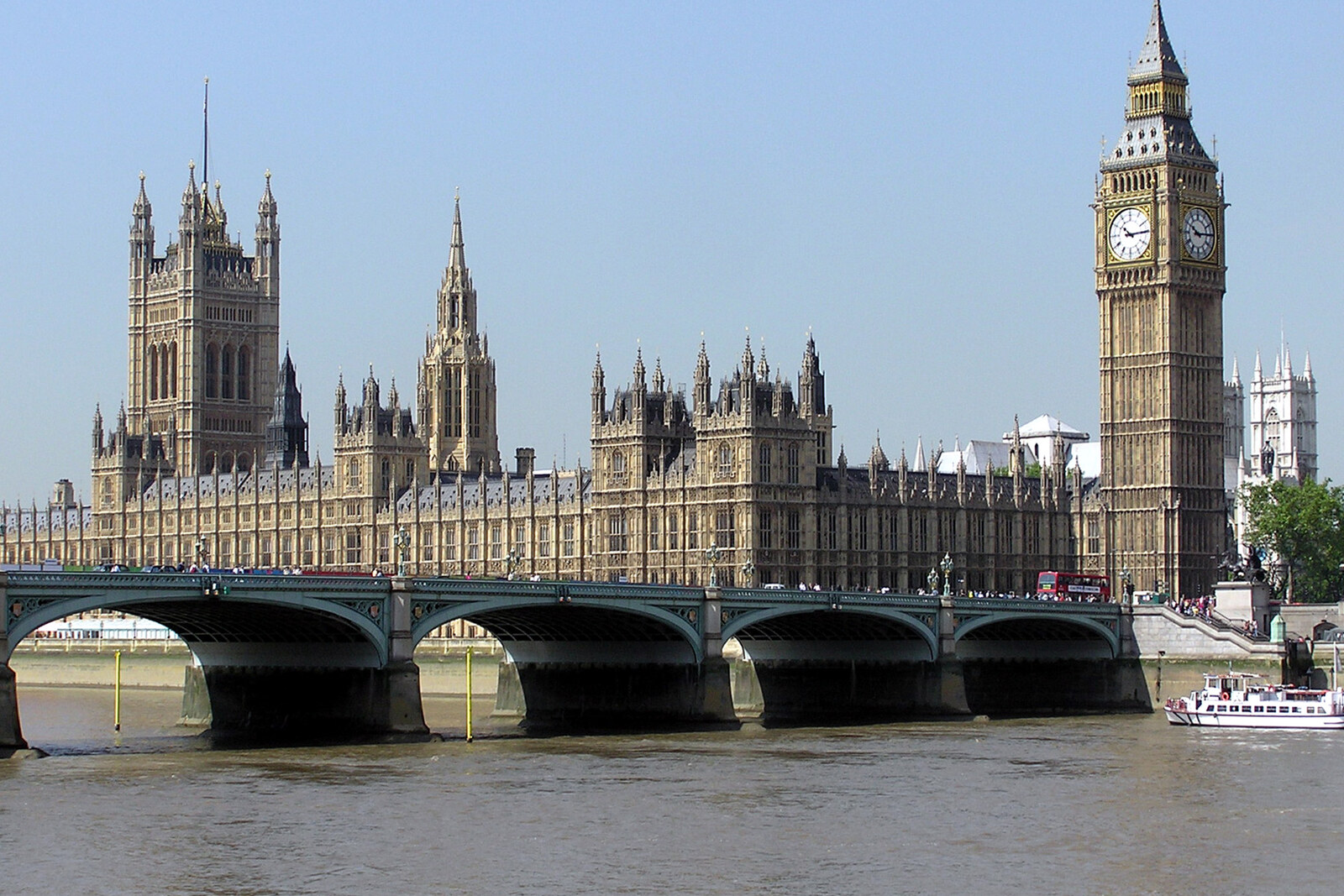 Parliament and Big Ben behind the arches of Westminster Bridge