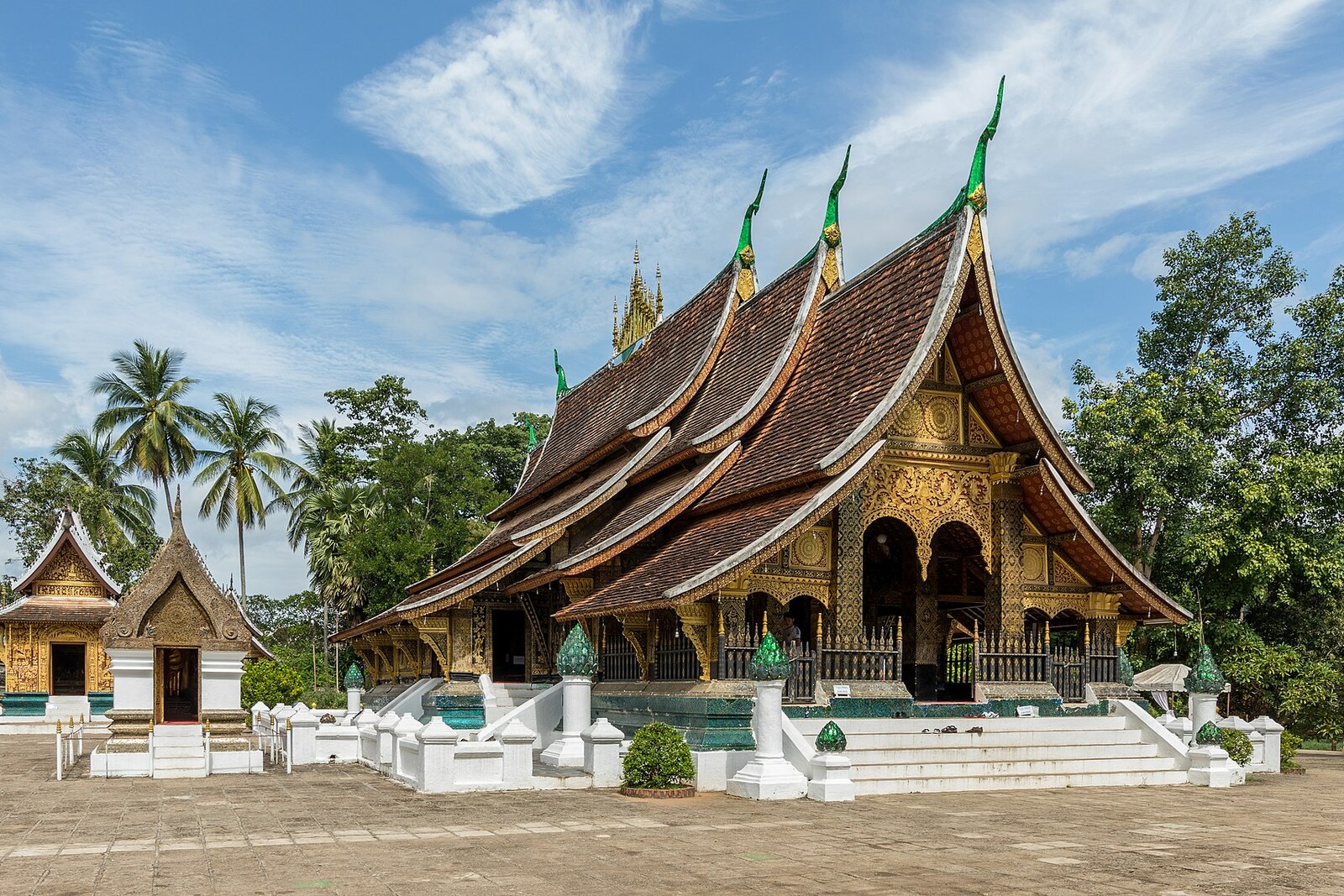 The low, layered roofs of Wat Xieng Thong's main hall.