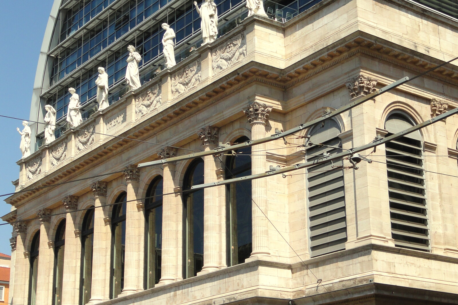 The Opéra de Lyon building with a classical façade and a semicircular glass dome