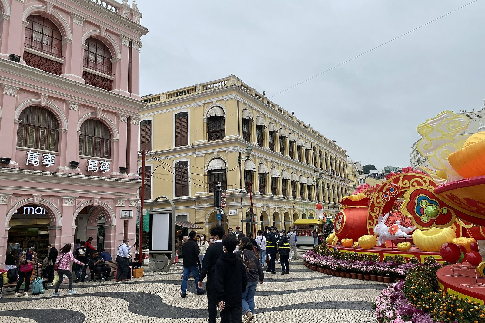 Senado Square with wave-pattern paving and historic façades.