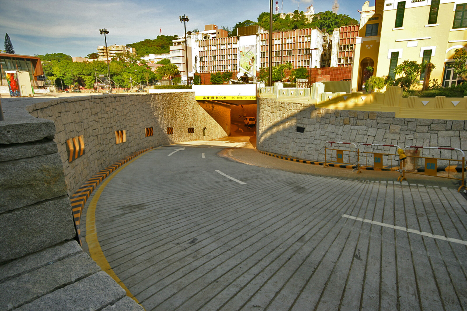 The broad Tap Seac Square with neoclassical yellow buildings and stone paving