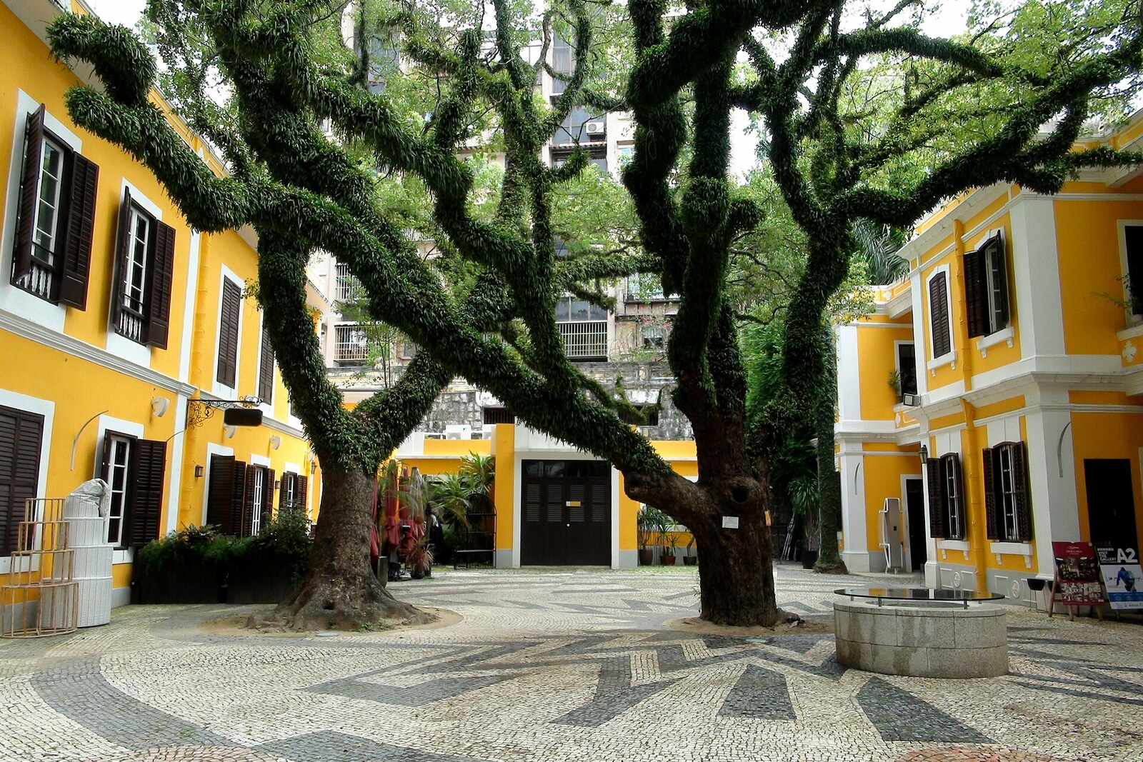 The courtyard and facade of Albergue SCM in the St. Lazarus District in Macao.