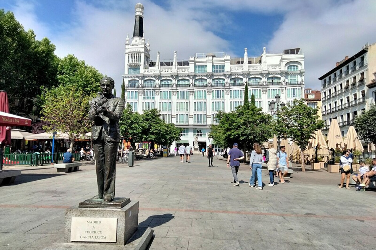 Plaza de Santa Ana with the monument to Federico García Lorca and the façade of Hotel Reina Victoria.