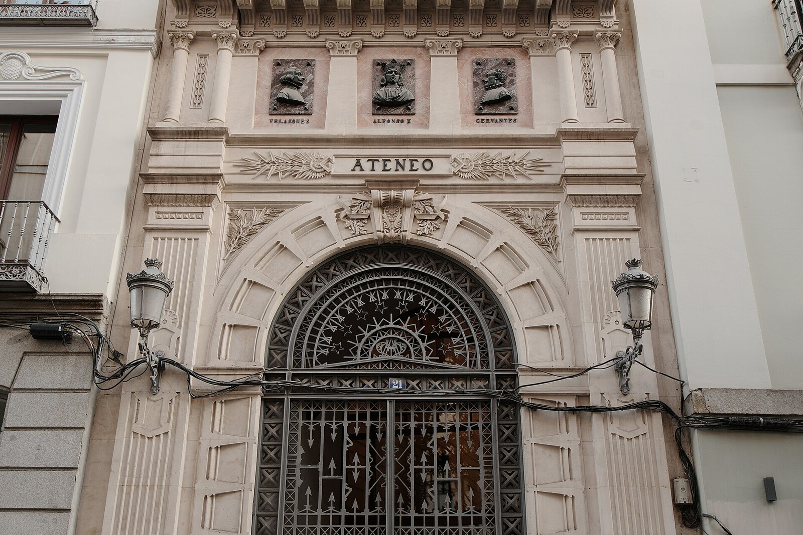 Entrance to the Ateneo de Madrid with classical columns and pediment.