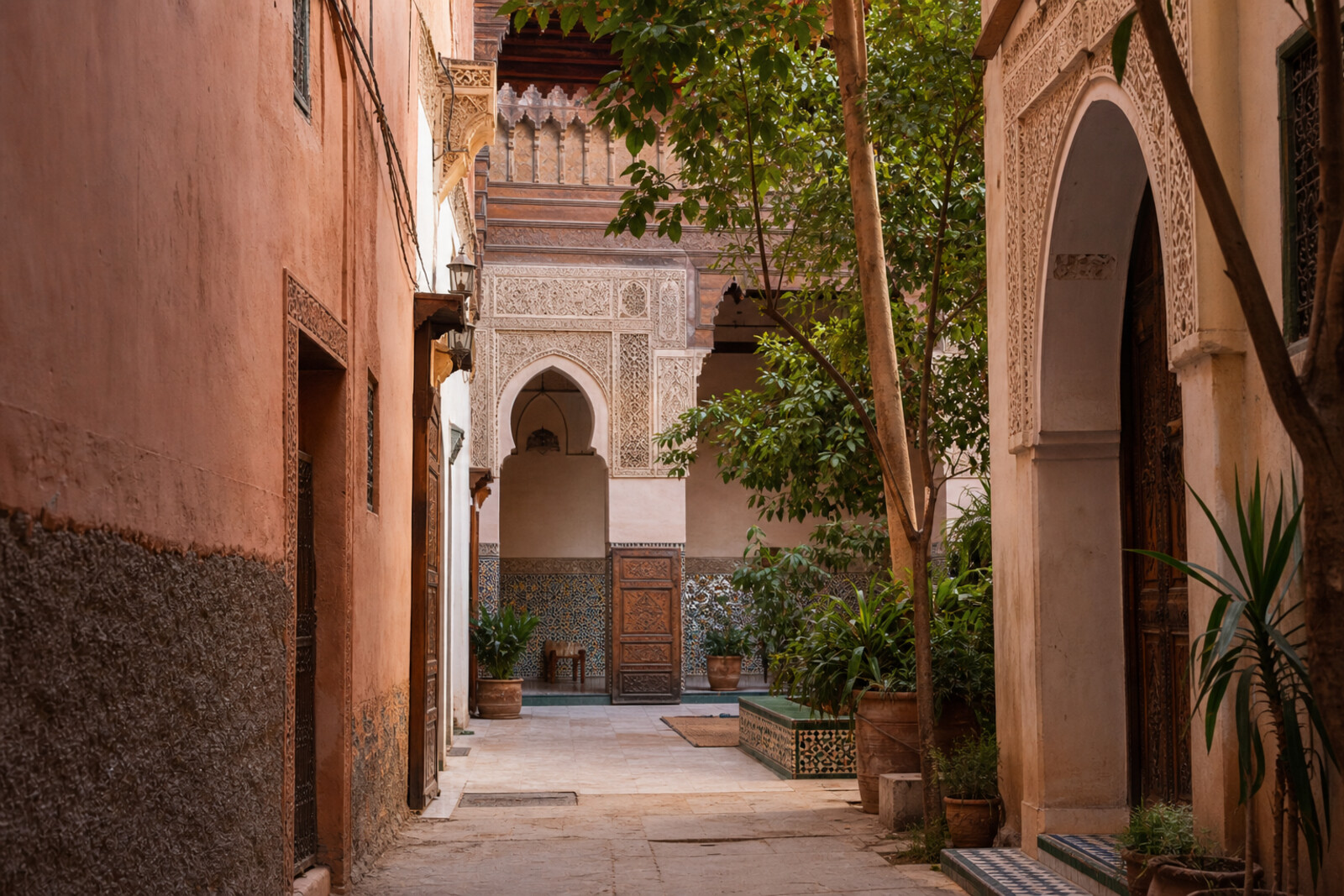 Abstract pattern of Moroccan tiles, arches, and courtyard motifs in warm colors