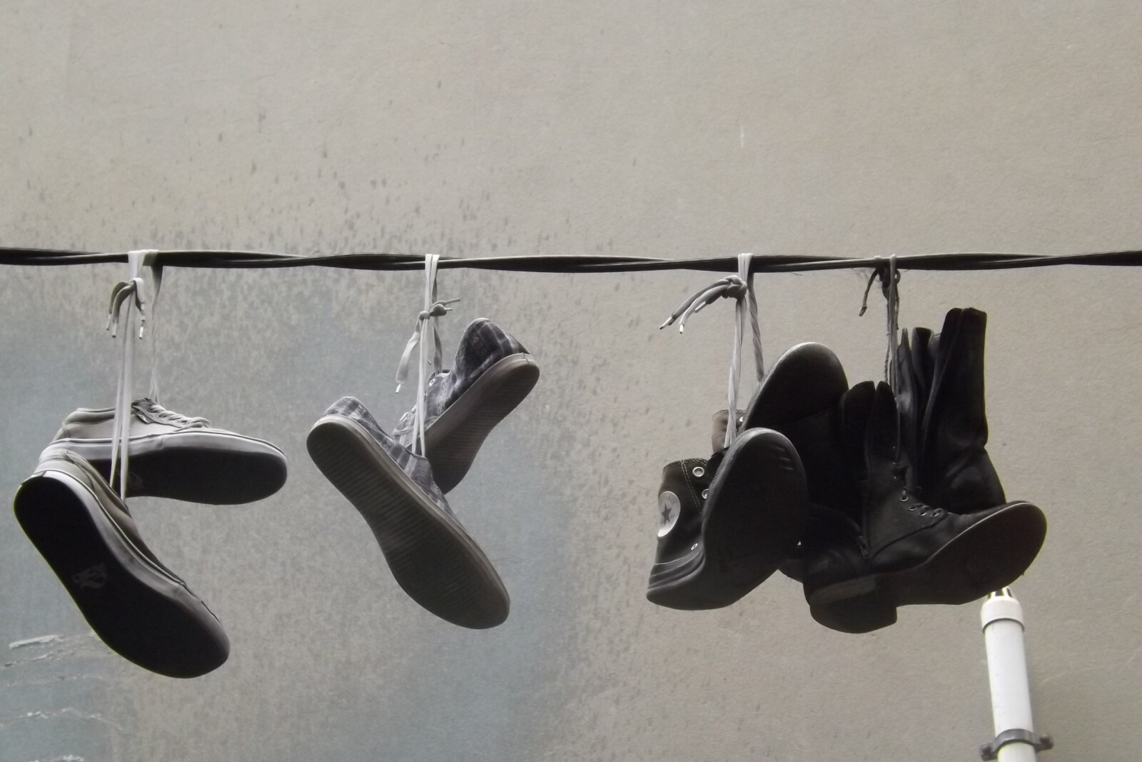 Detail of hanging shoes in Hosier Lane, Melbourne.