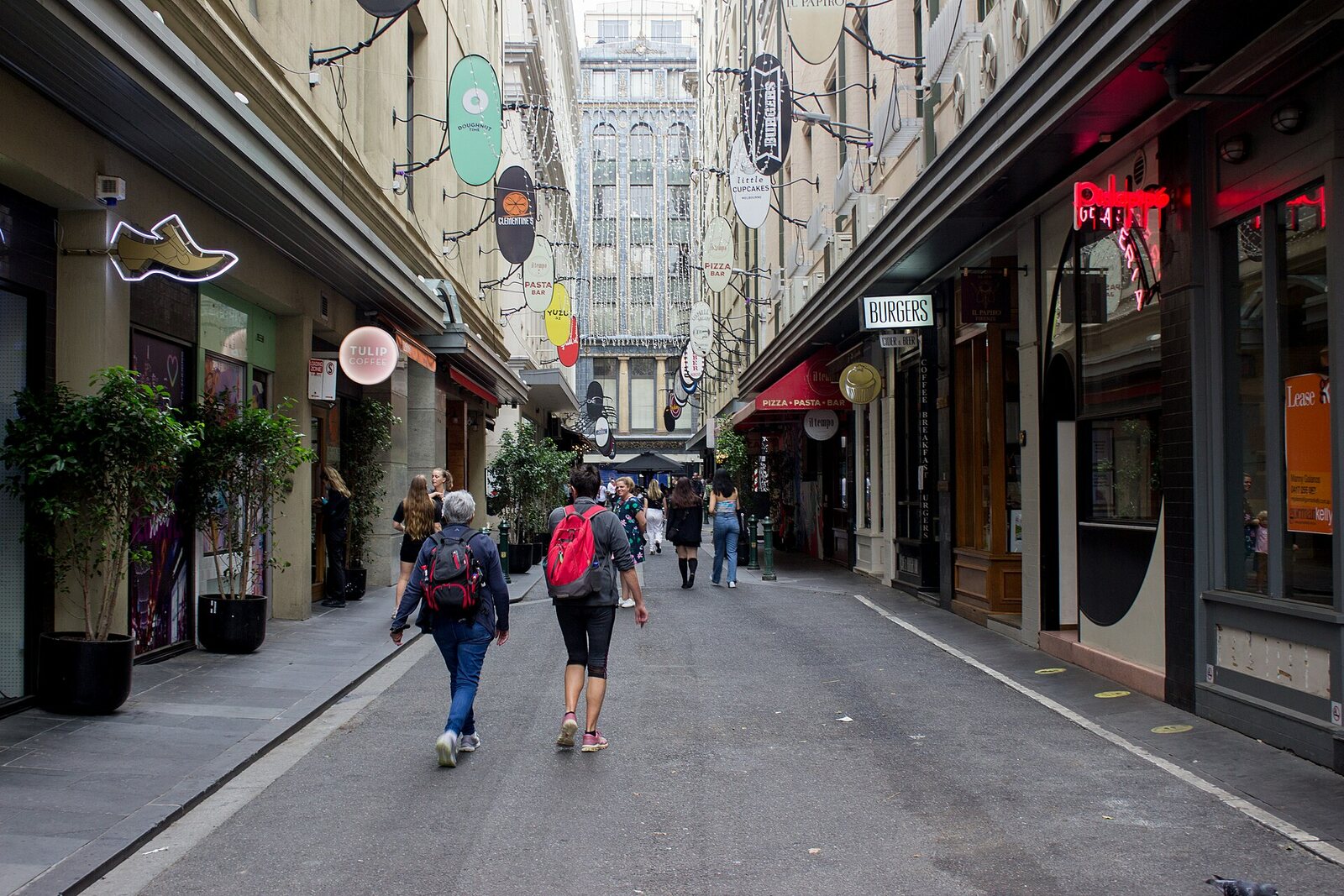 Degraves Street by day: a narrow passage, cafe tables, and the lane’s northward view.