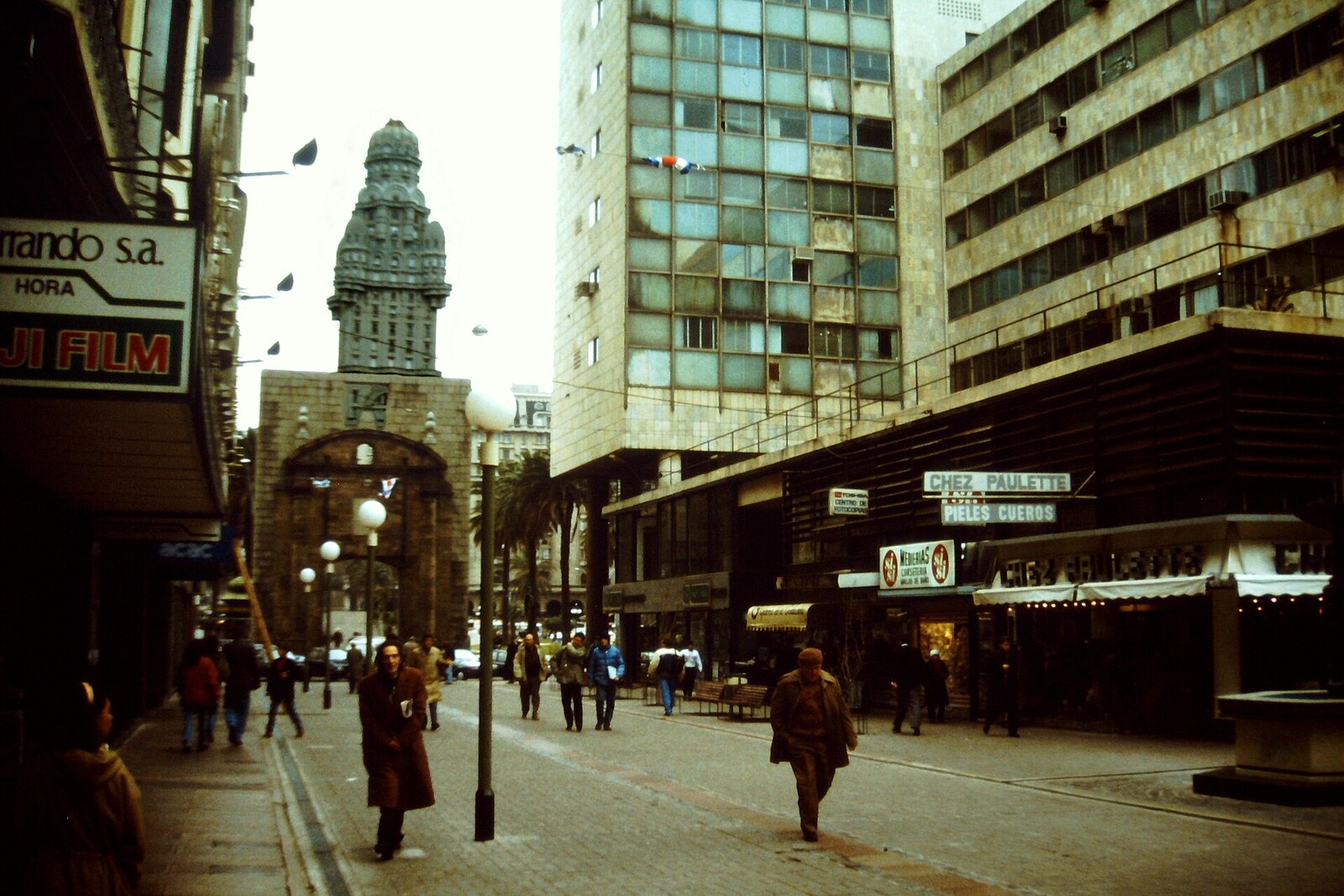 Pedestrian Sarandí Street with the Citadel Gate in the background.