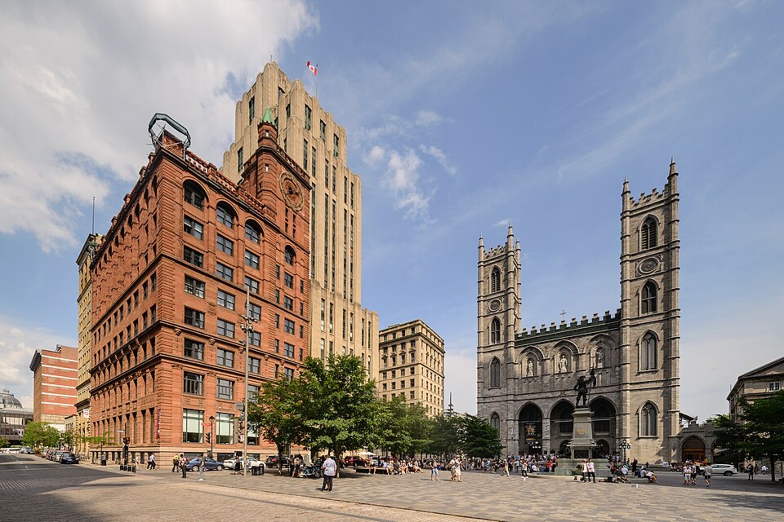 Place d'Armes in Old Montreal with historic buildings around the square
