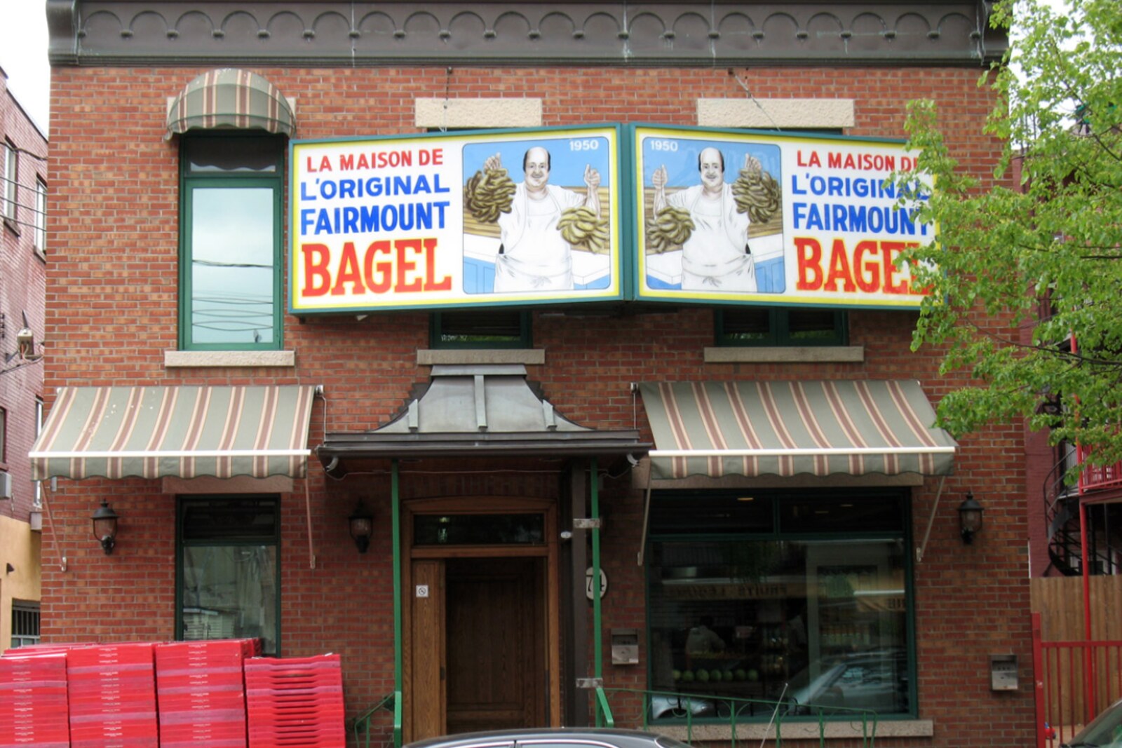 The façade of Fairmount Bagel with its distinctive sign