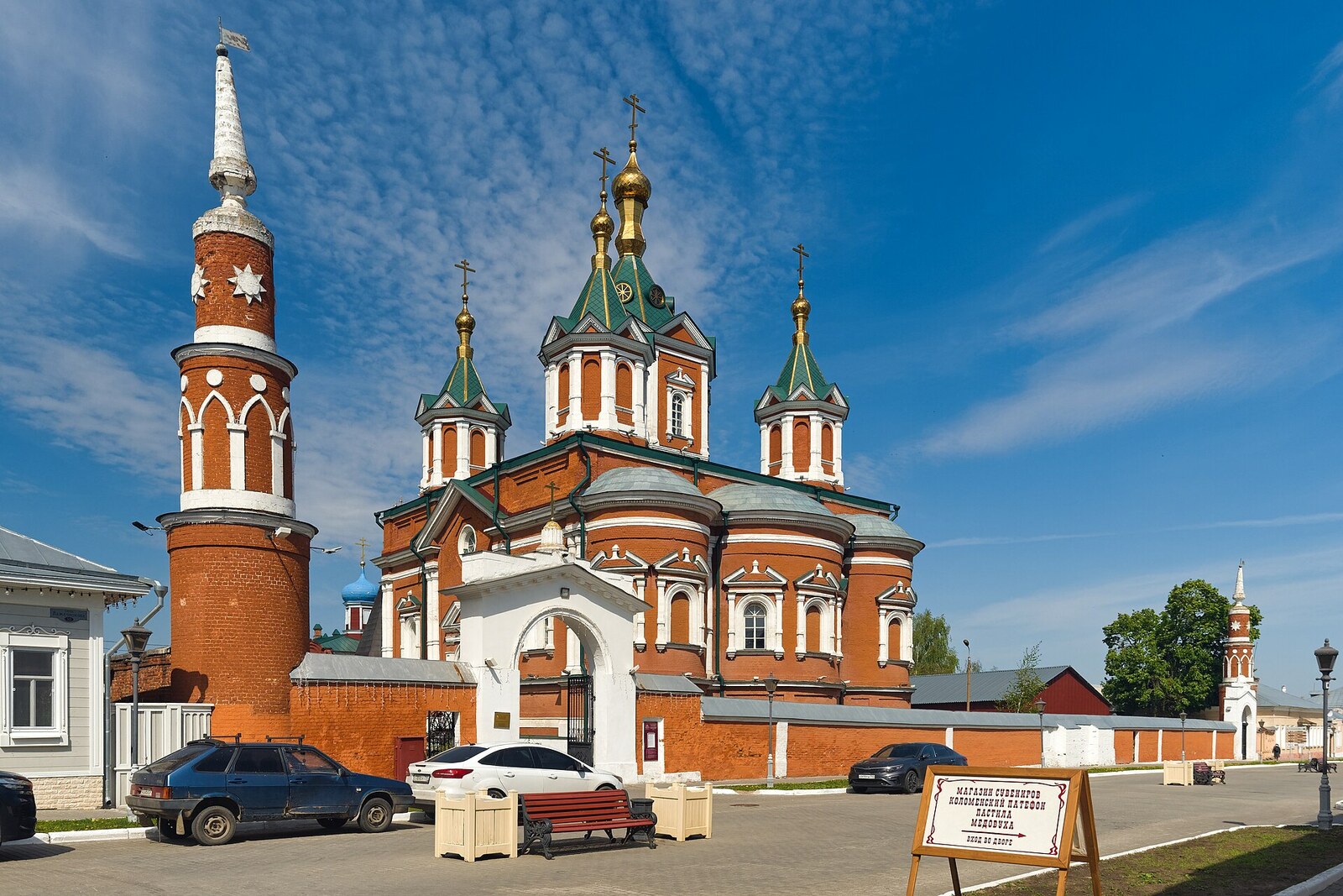 Cathedral of the Exaltation of the Cross behind the red-and-white fence of Brusensky Assumption Monastery.