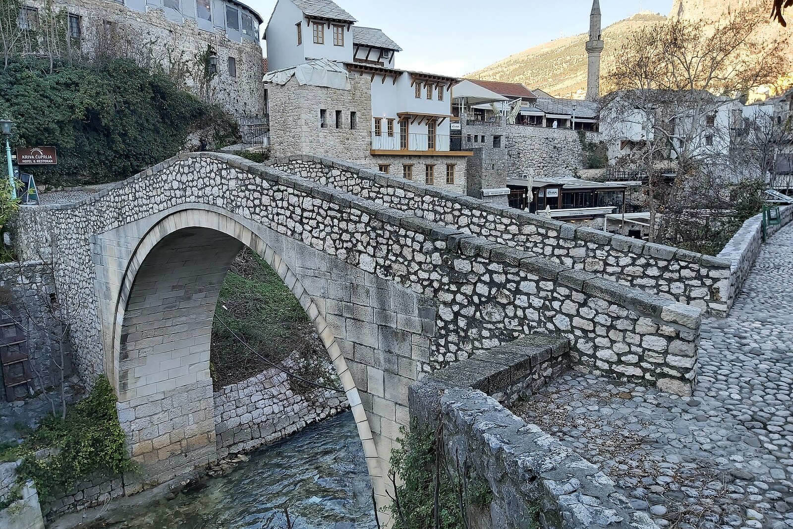 Crooked Bridge spans the Radobolja with a single stone arch.