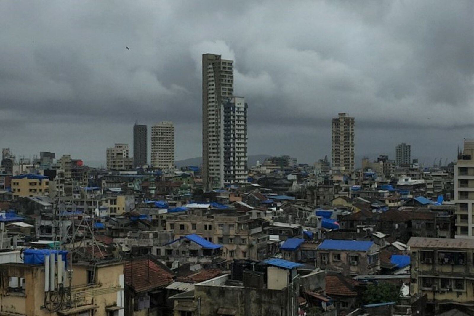 Dense urban development and facades in Mumbai's Bhuleshwar district.