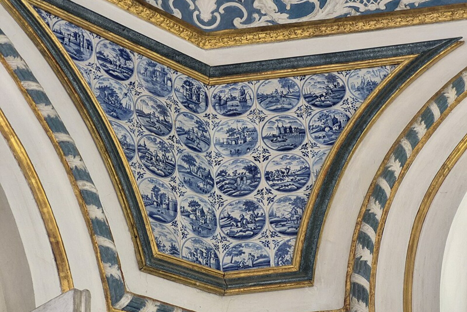 The interior hall of Pagodenburg with blue panels and painted decoration.