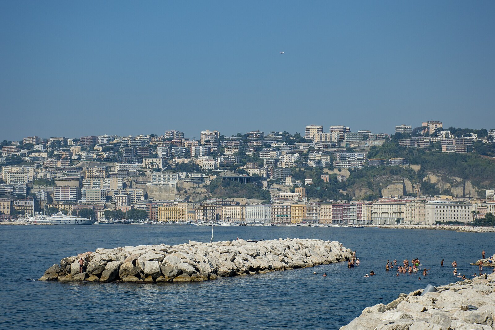 View from the Lungomare waterfront in Naples of the sea and the shoreline.