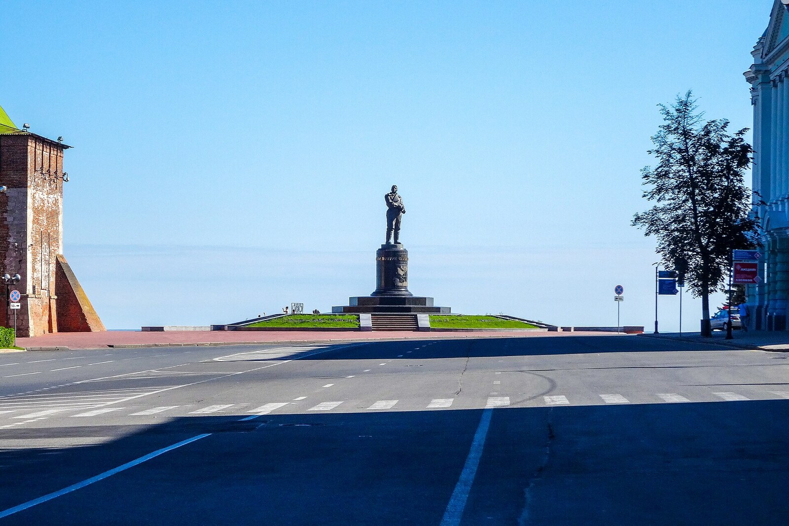 Bronze figure of Valery Chkalov on a tall pedestal by the Volga Slope