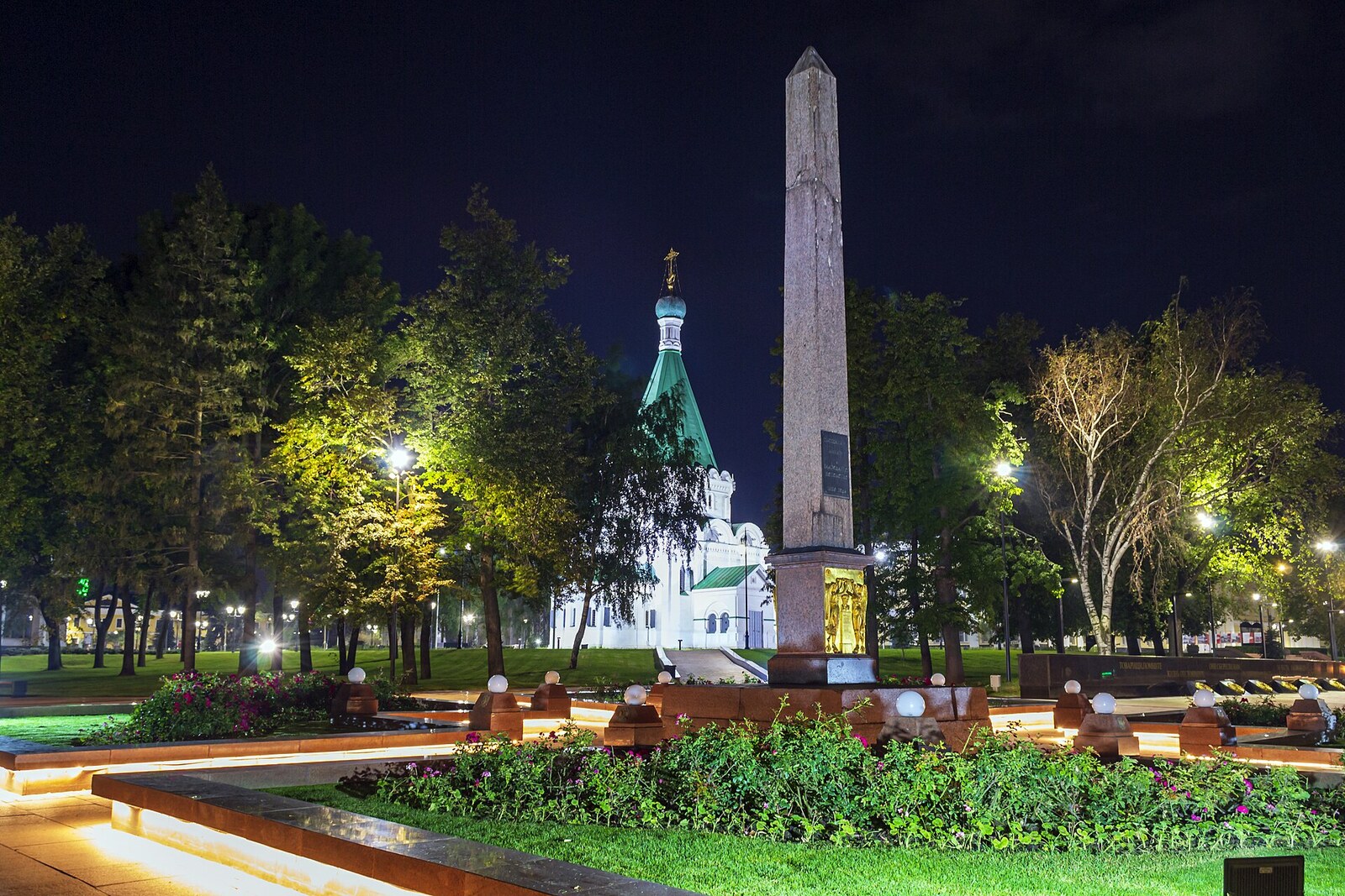 The granite Minin and Pozharsky Obelisk in front of Archangel Michael Cathedral