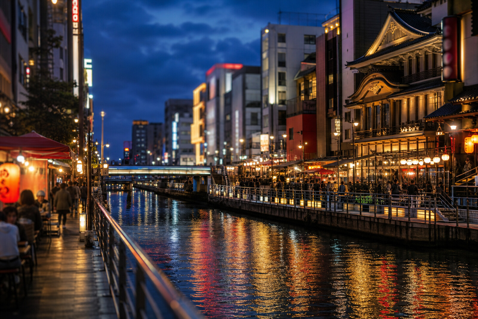 Dotonbori Canal at night with neon, a theatre, and street food