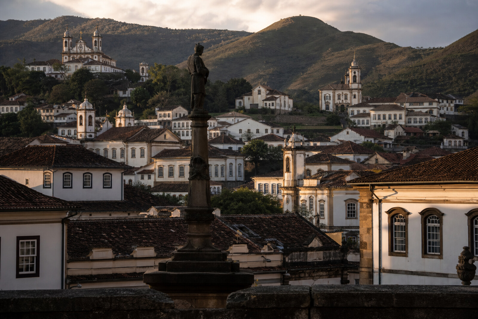 Illustrated cover for a route through Vila Rica, with the hills of Ouro Preto, church silhouettes, and a hint of the Tiradentes Monument.