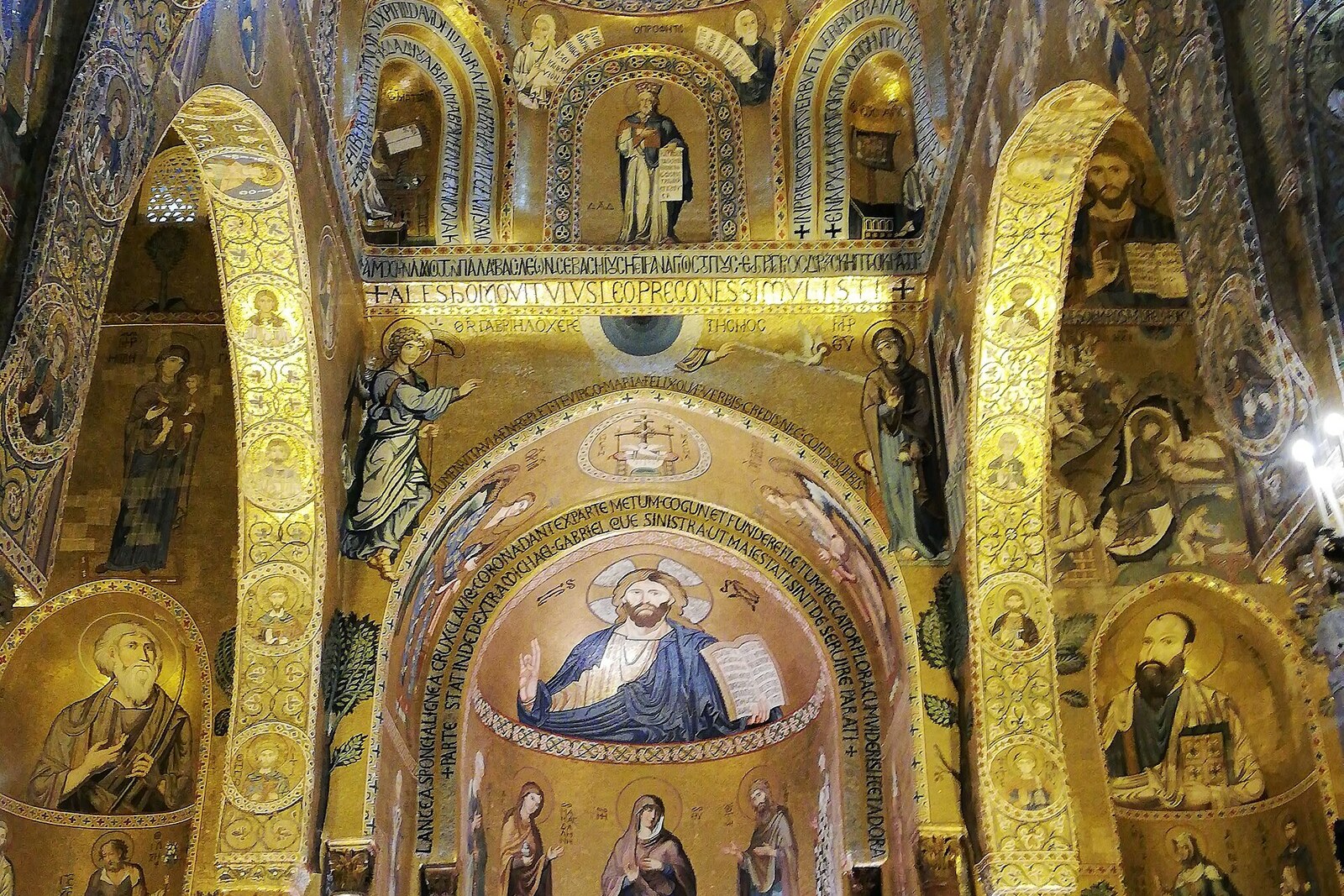 The golden mosaics, apse, and dome of the Palatine Chapel.