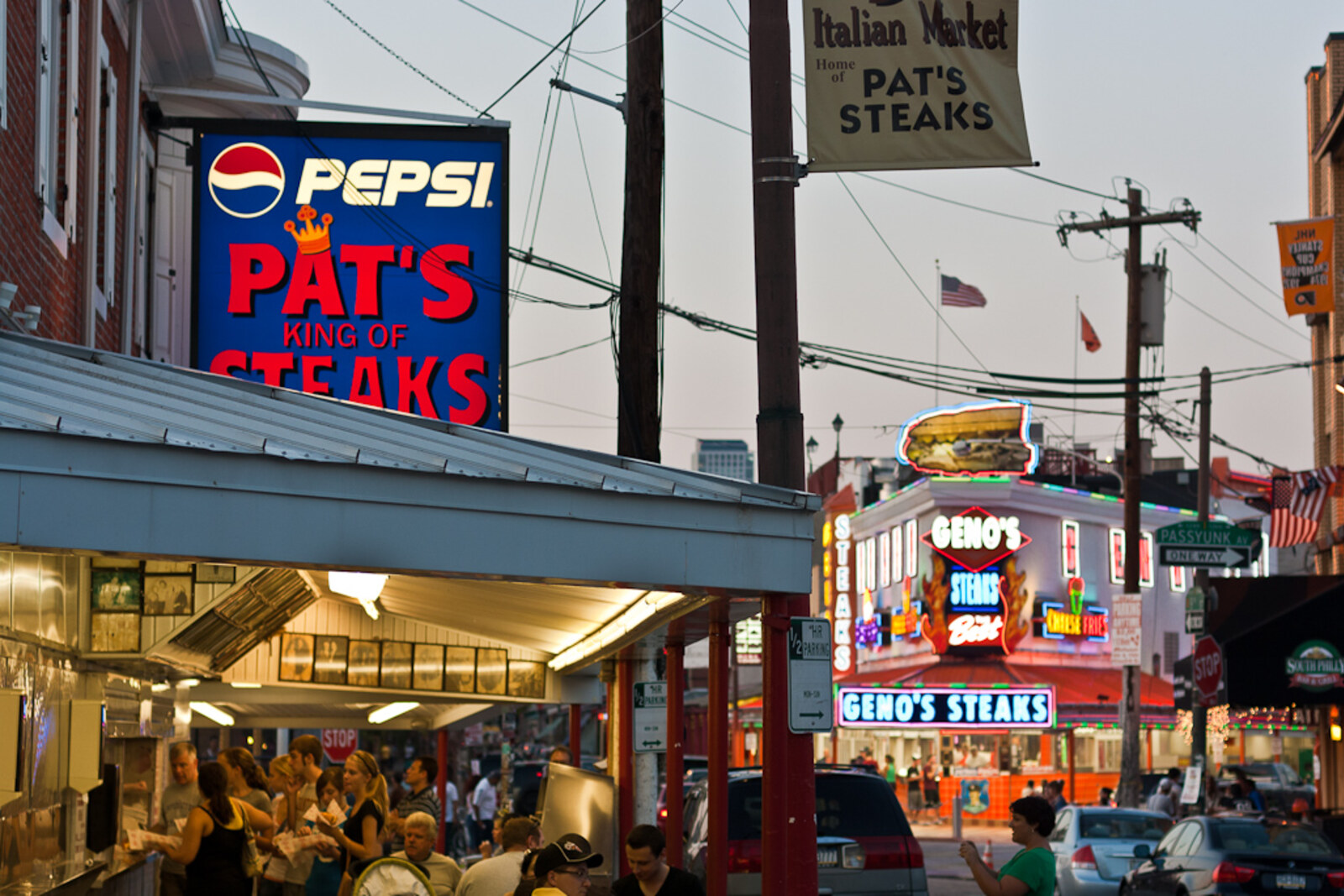 Pat's and Geno's opposite each other at an intersection in South Philadelphia.