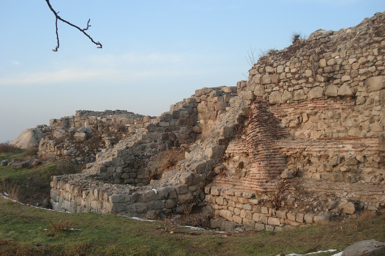 The stone fortress wall of Nebet Tepe with horizontal brick bands