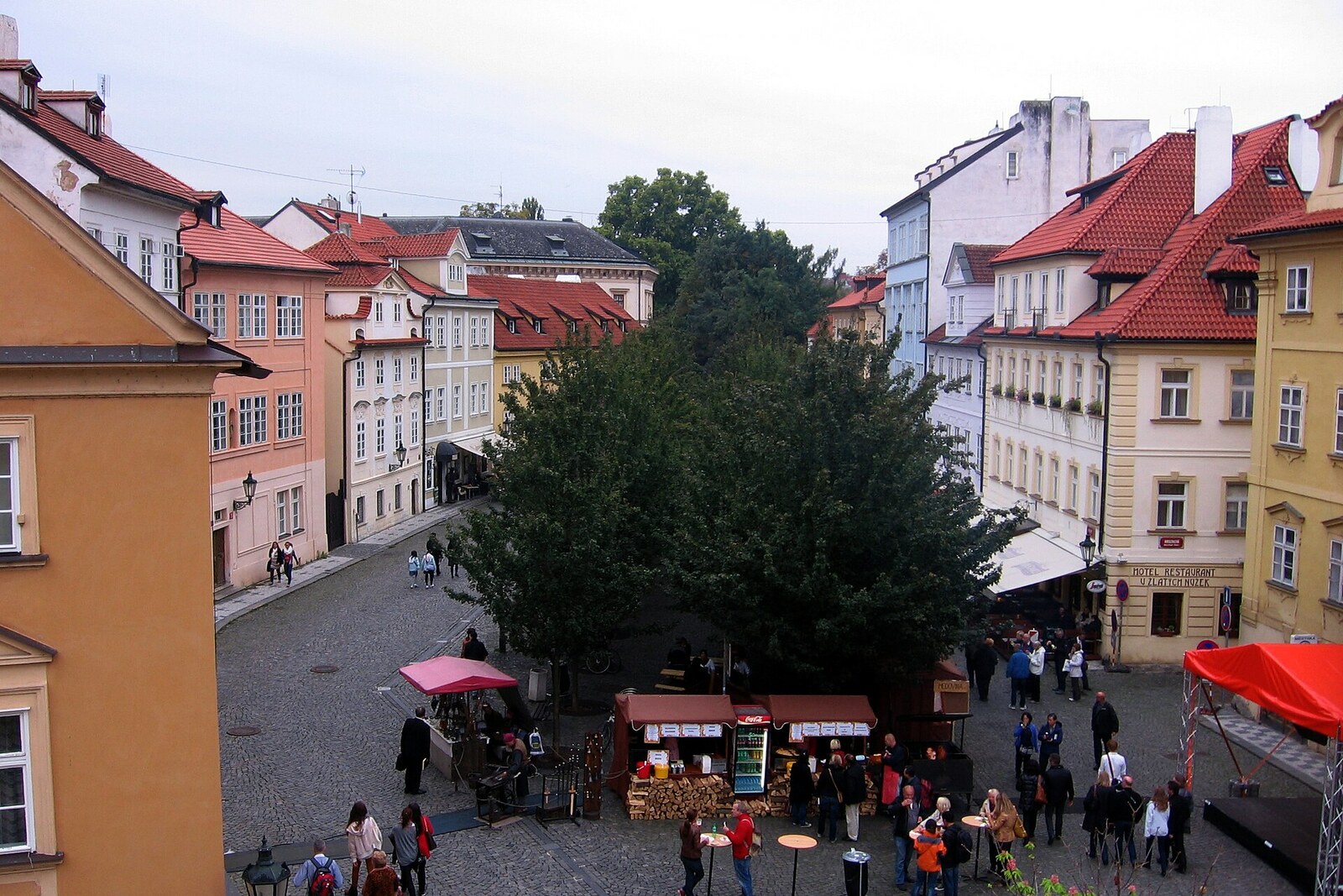 Kampa in Prague, with trees, water, and historic houses.