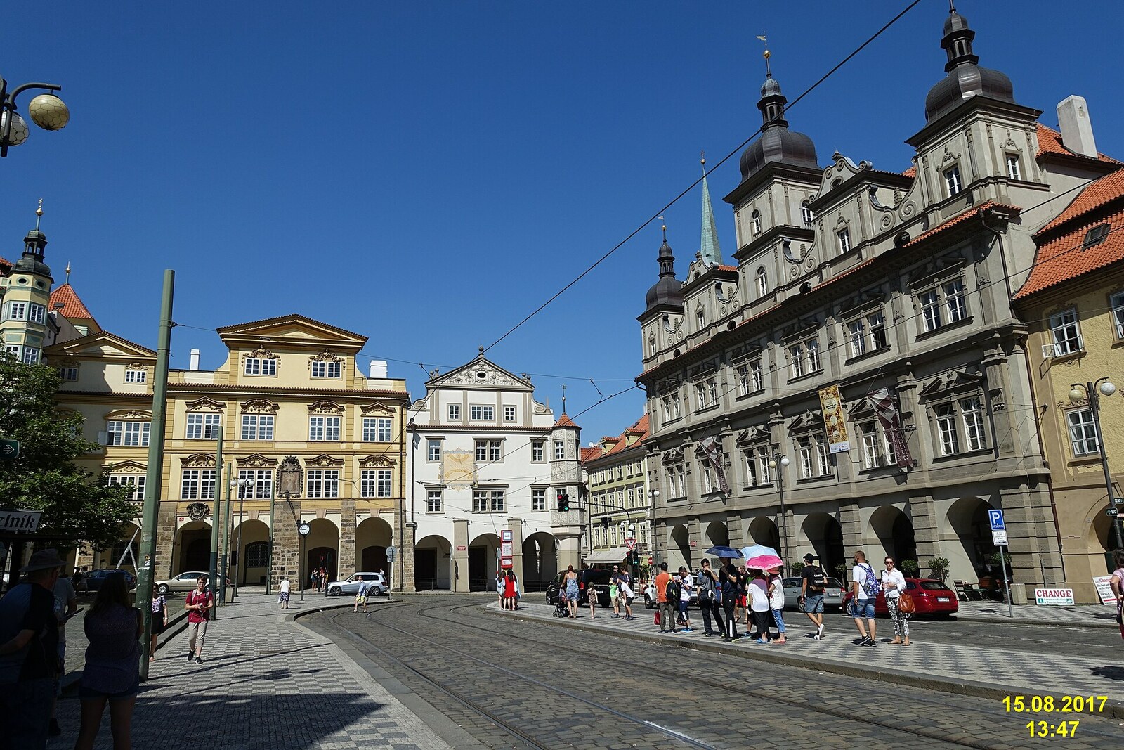Lesser Town Square in Prague with the façade and dome of St. Nicholas Church.