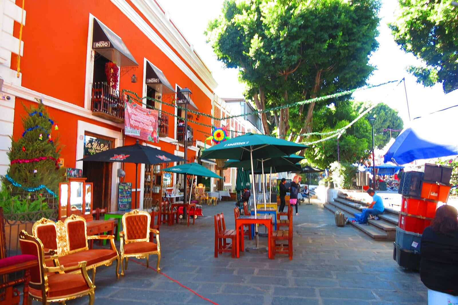 Antique chairs and market stalls in Plazuela de los Sapos in Puebla.