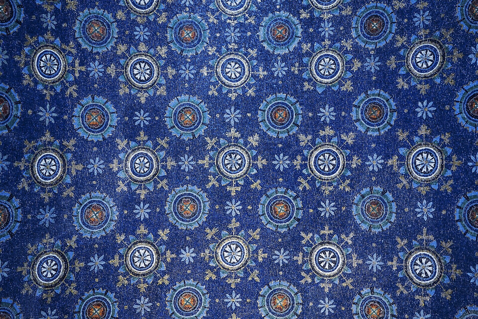 Blue and gold mosaics on the vault of the Mausoleum of Galla Placidia.