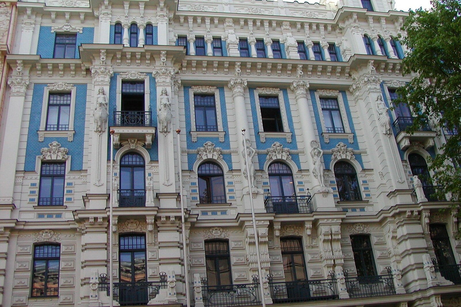 Art Nouveau building on Strēlnieku Street with mascarons and ornaments