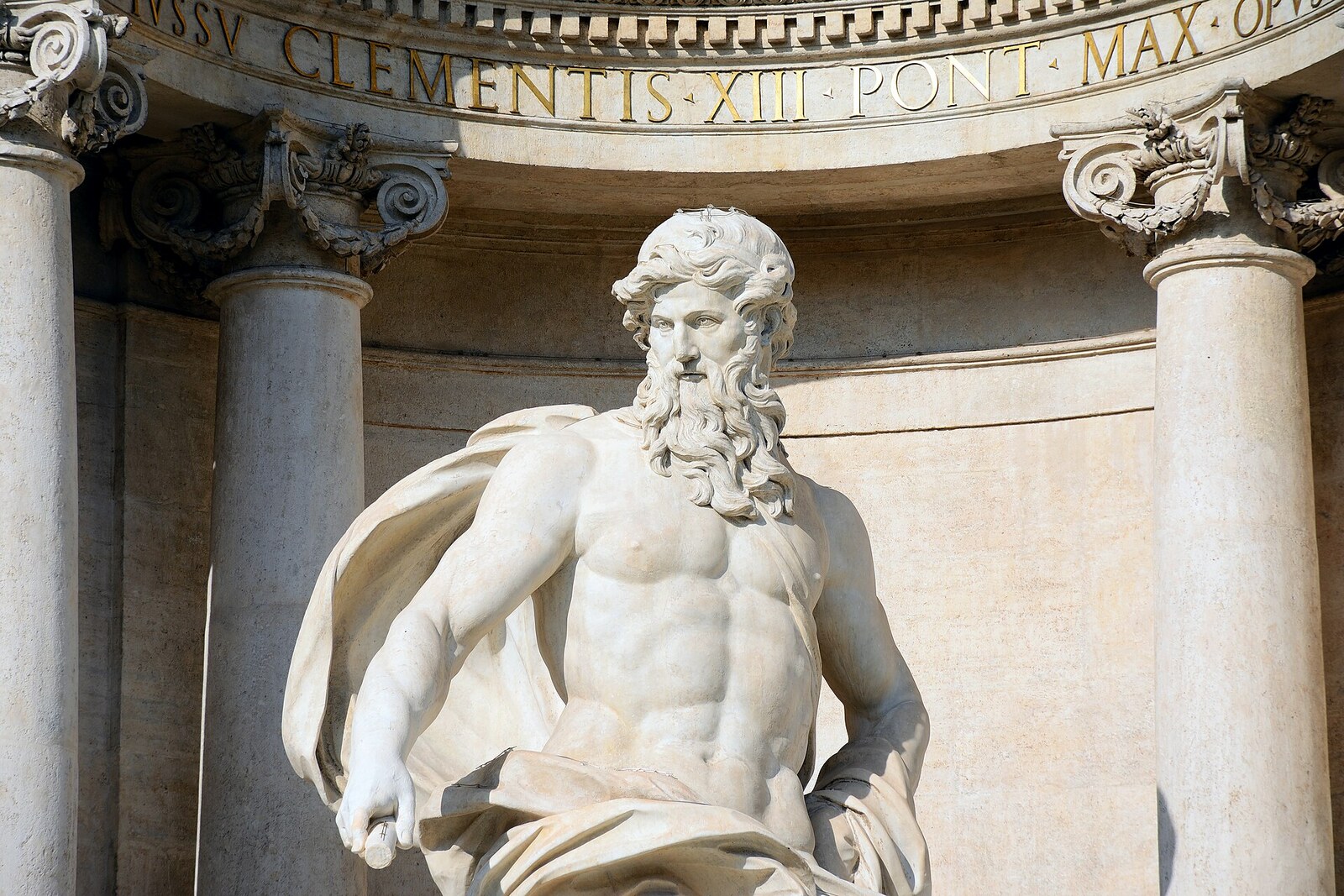 Statue of Oceanus at Trevi Fountain with columns in the background