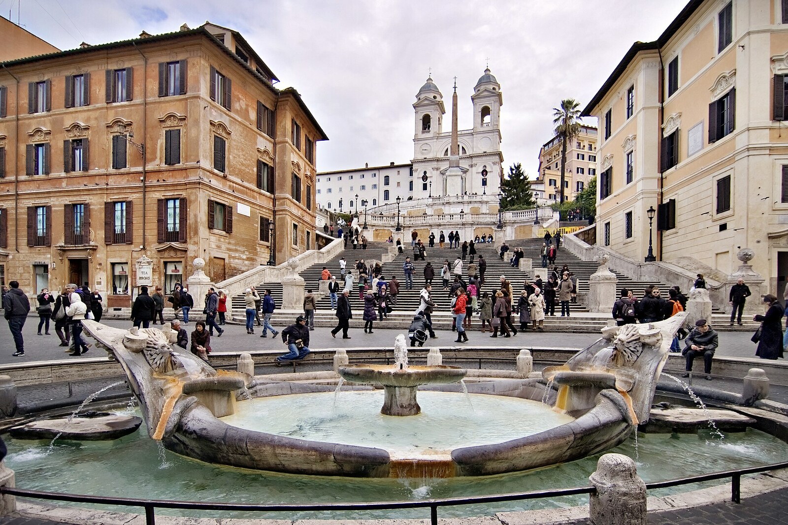The Barcaccia Fountain and the Spanish Steps with the church at the top