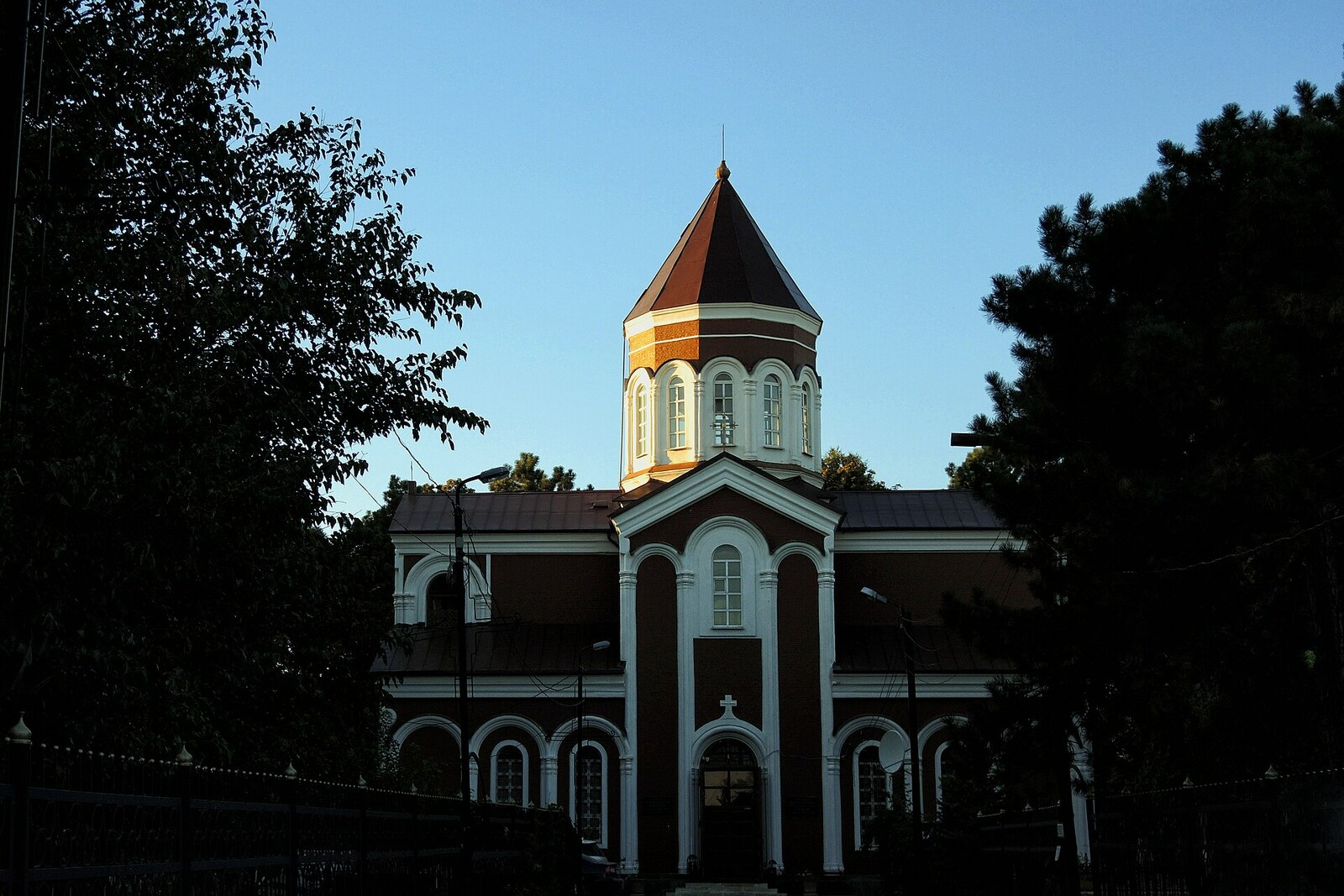 The stone Surp Karapet Church with a tall drum and a conical dome.