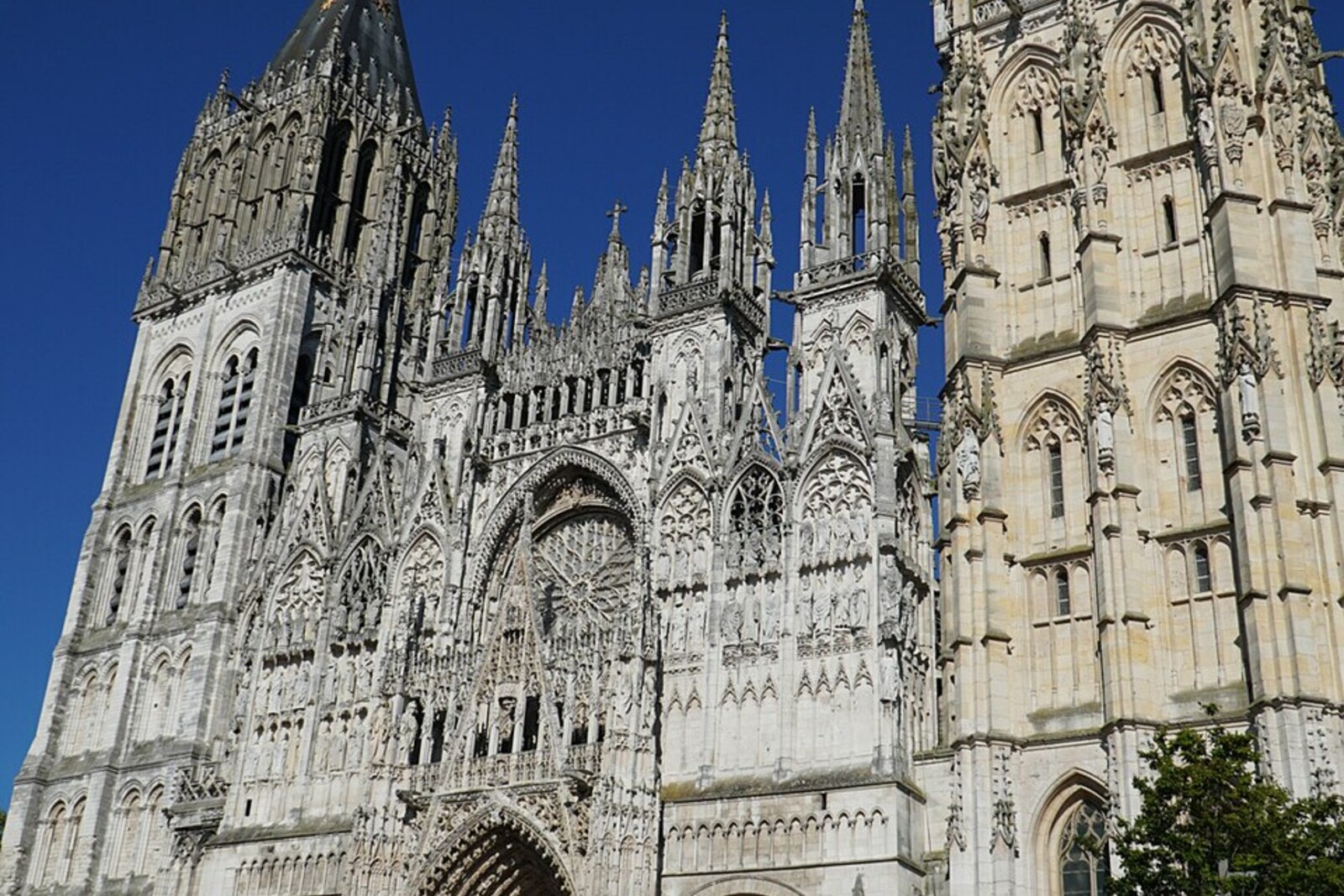 The light Gothic façade of Rouen Cathedral.
