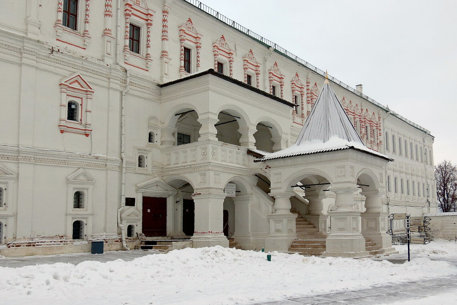 The white ceremonial porch of Oleg's Palace and the facade with red window surrounds